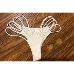 White strappy bathing suit bottoms